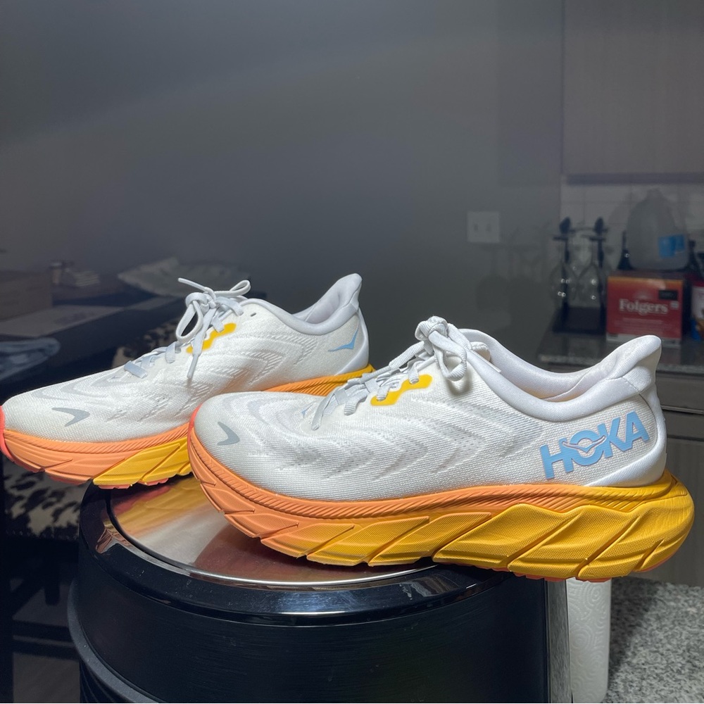 White and orange Hokas